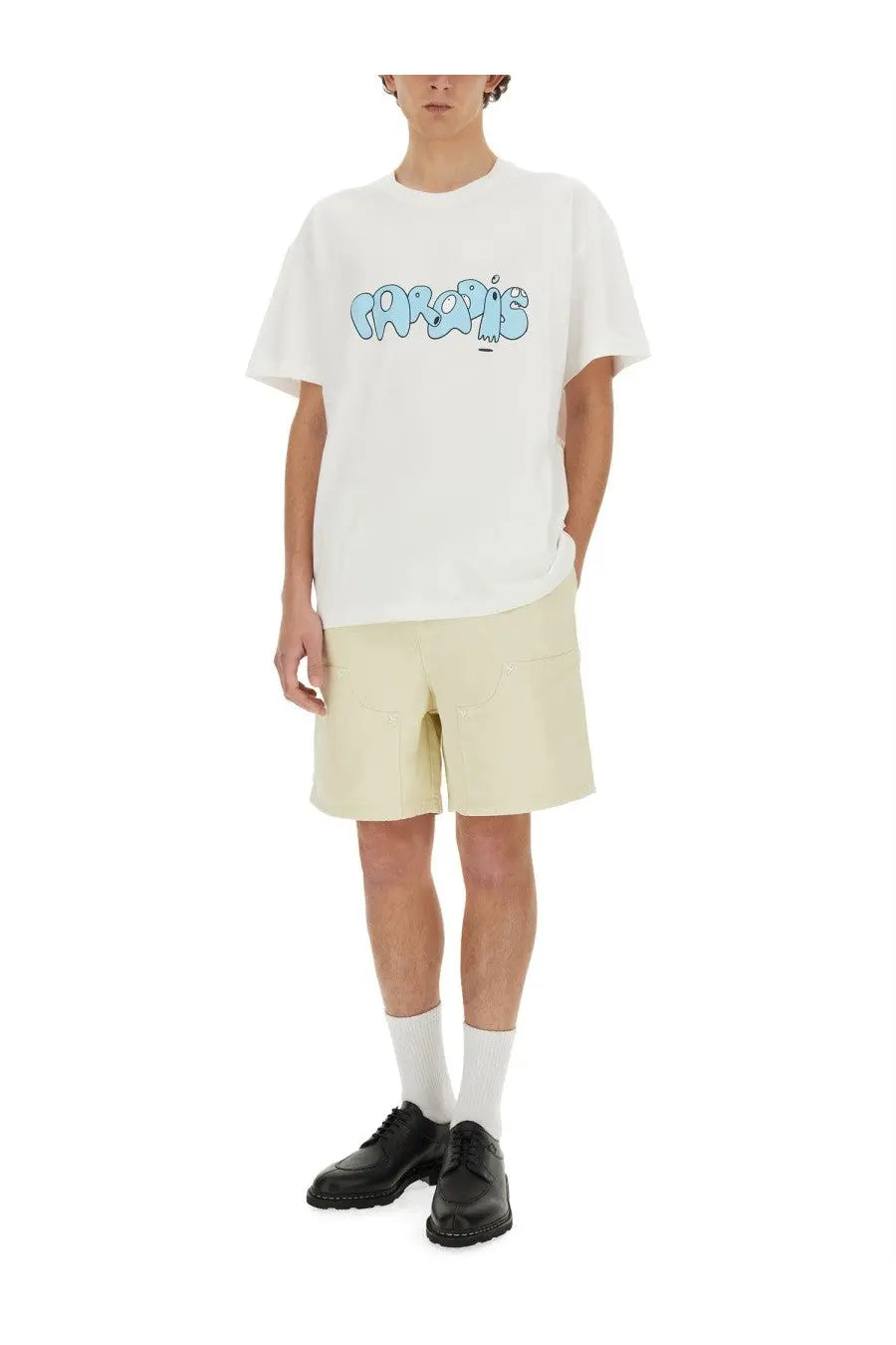 White t-shirt with light blue graffiti print paired with 3.paradis men’s beige twill shorts front view