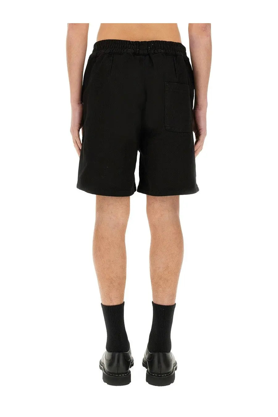 Black cotton twill men’s shorts with elastic waistband and right side patch pocket from 3.paradis