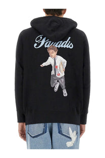 Black men’s zip sweatshirt featuring a detailed cartoon boy illustration and paradis script on a hooded design