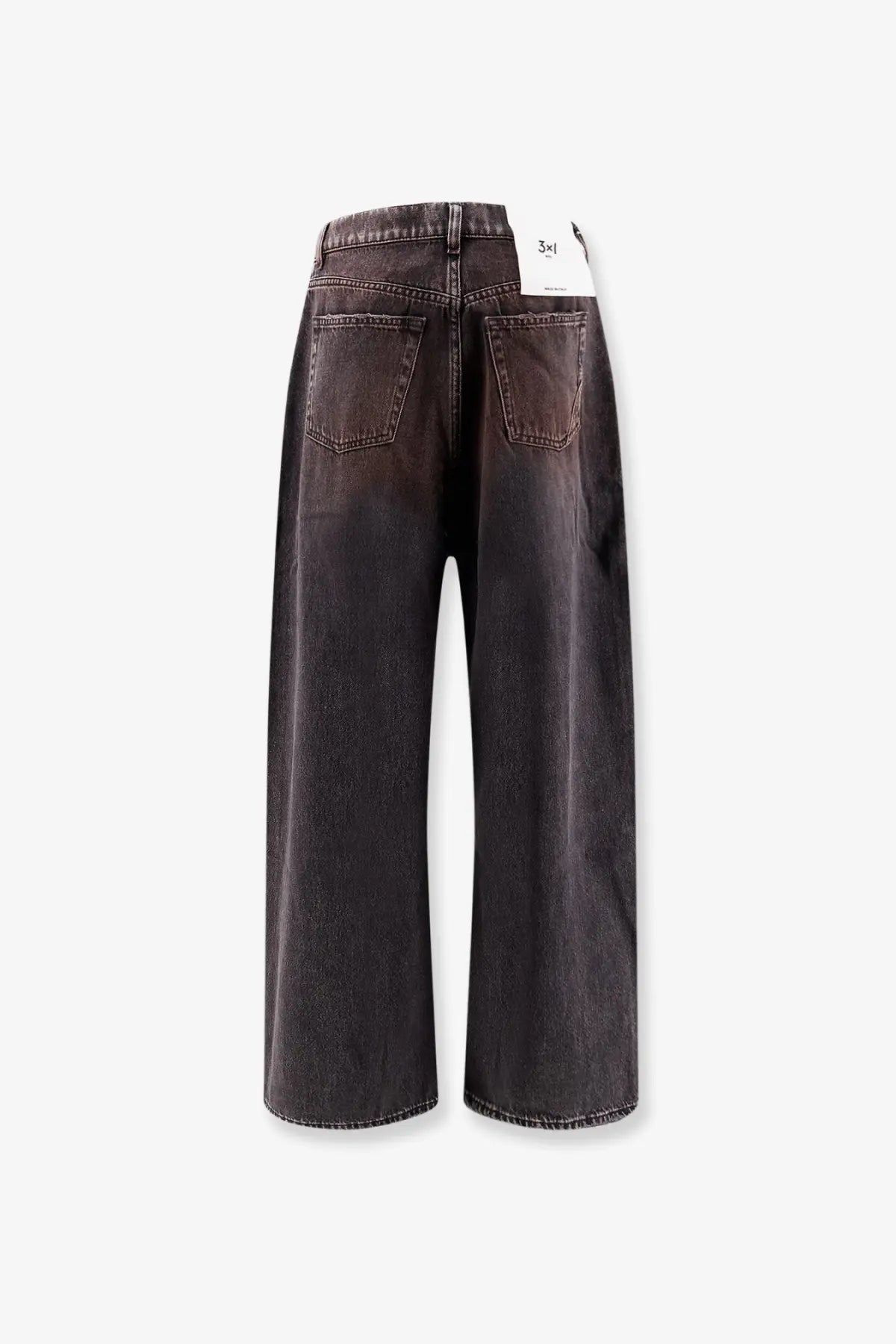 Back view of 3x1 women’s denim skater jeans gold in dark gray wide-leg denim with faded wash and classic back pockets