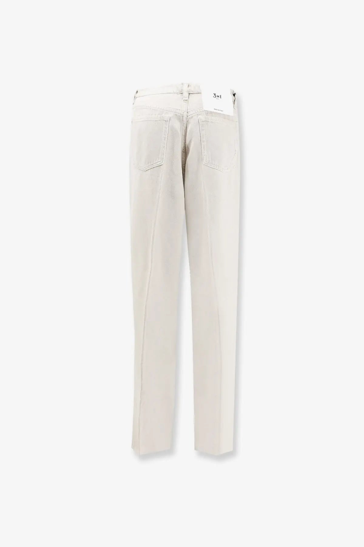 A pair of 3x1 women’s flip denim trousers in beige with a straight-leg fit and minimalist stitching design