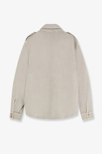 Beige denim jacket with buttoned cuffs and shoulder patches made of cotton by 3x1 women’s Kenya shirt collection