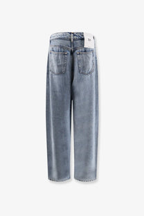 3x1 women’s skater boyfriend jeans in light-wash denim with a relaxed wide-leg cut shown from the back side
