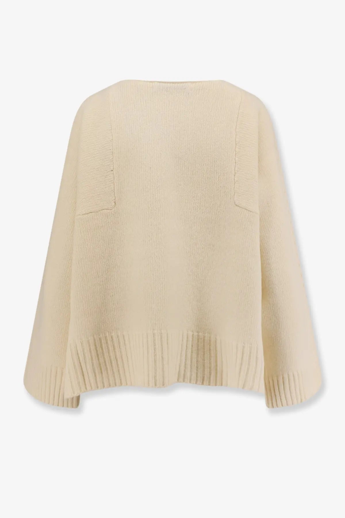 Cream-colored ribbed-knit poncho-style sweater with wide sleeves and patch pockets in virgin wool from the 73 women