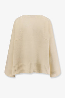 Cream-colored ribbed-knit poncho-style sweater with wide sleeves and patch pockets in virgin wool from the 73 women