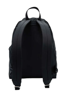 A.P.C men’s backpack black nylon with padded shoulder straps and top handle shown from the back side