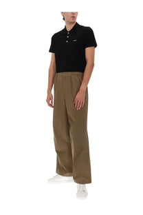 Black short-sleeved polo shirt with white button placket and small embroidered logo on chest for a casual look
