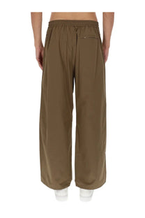 A.p.c men’s brown benjamin pants with olive green loose fit and elastic waistband for casual wear