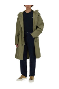 Olive green hooded trench coat with zipper front and button closures paired with a.p.c men shirt boxy blue