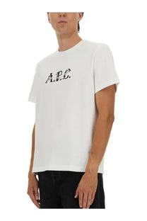 A white cotton a.p.c men’s shirt featuring a black embroidered logo across the chest