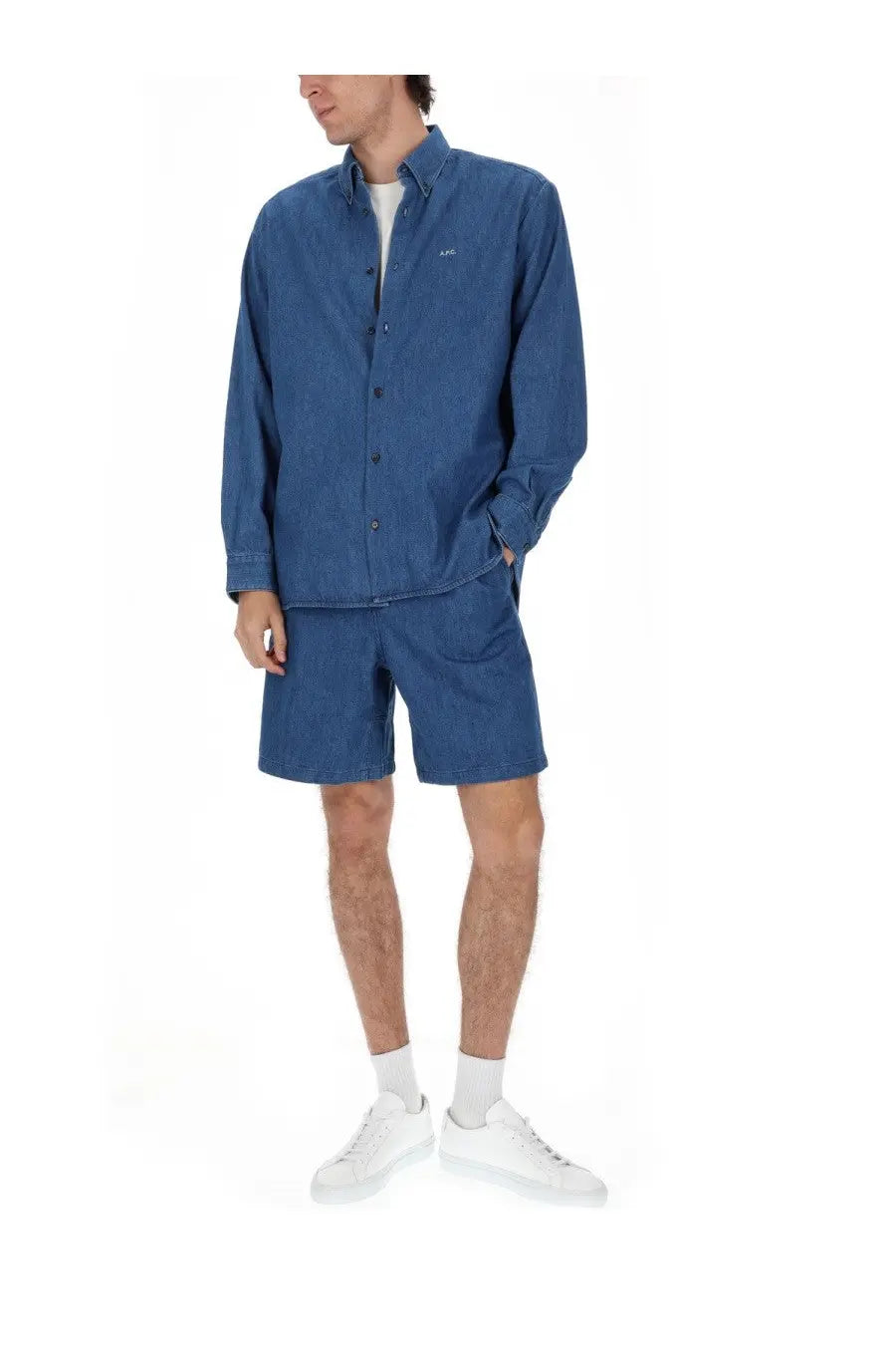 A.P.C mens blue denim button-up shirt with subtle textured weave and small embroidered logo on the chest