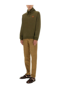 A.p.c men’s standard olive green hooded sweatshirt with small orange embroidered logo on the chest