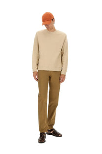 Beige a.p.c men’s standard sweatshirt with crewneck, long sleeves, and ribbed cuffs in a soft cotton blend