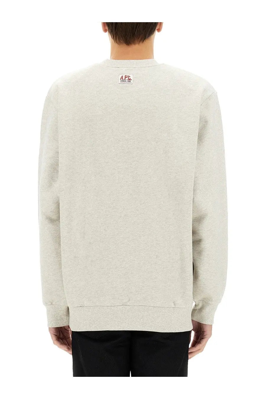 A light heather gray a.p.c. men’s sweatshirt made of soft cotton perfect for casual wear