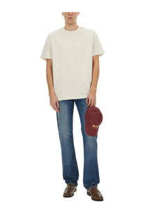 A maroon baseball cap with gold embroidered lettering shown from the back in the apc unisex shirt lenny white product image