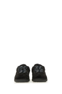A.P.C unisex sneaker Moe black low-top made of black suede with textured laces and a rubber sole