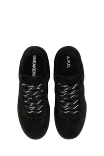 A.P.C unisex sneaker moe black suede with white speckled laces and branding on the insole