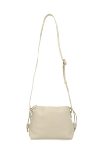 A.P.C women’s ninon mini beige crossbody bag with cream color, minimalist design, adjustable strap, and metallic hardware accents