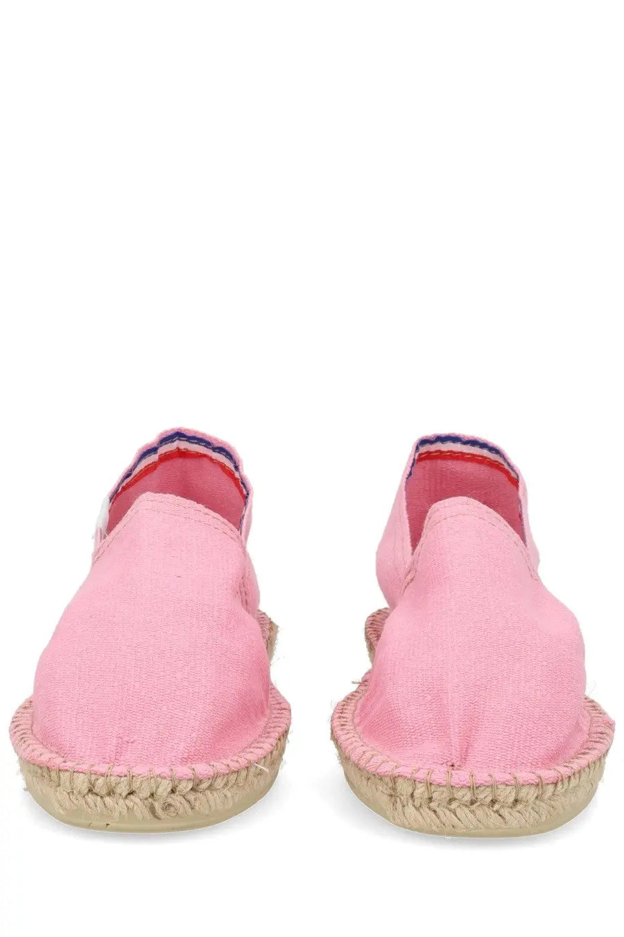 A.P.C women’s espadrilla in blue canvas with woven jute sole and red white and blue striped heel trim shown from the back