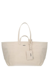 A.P.C women’s LE drummer tote bag pink cream-colored canvas with matching handles and small branded tag