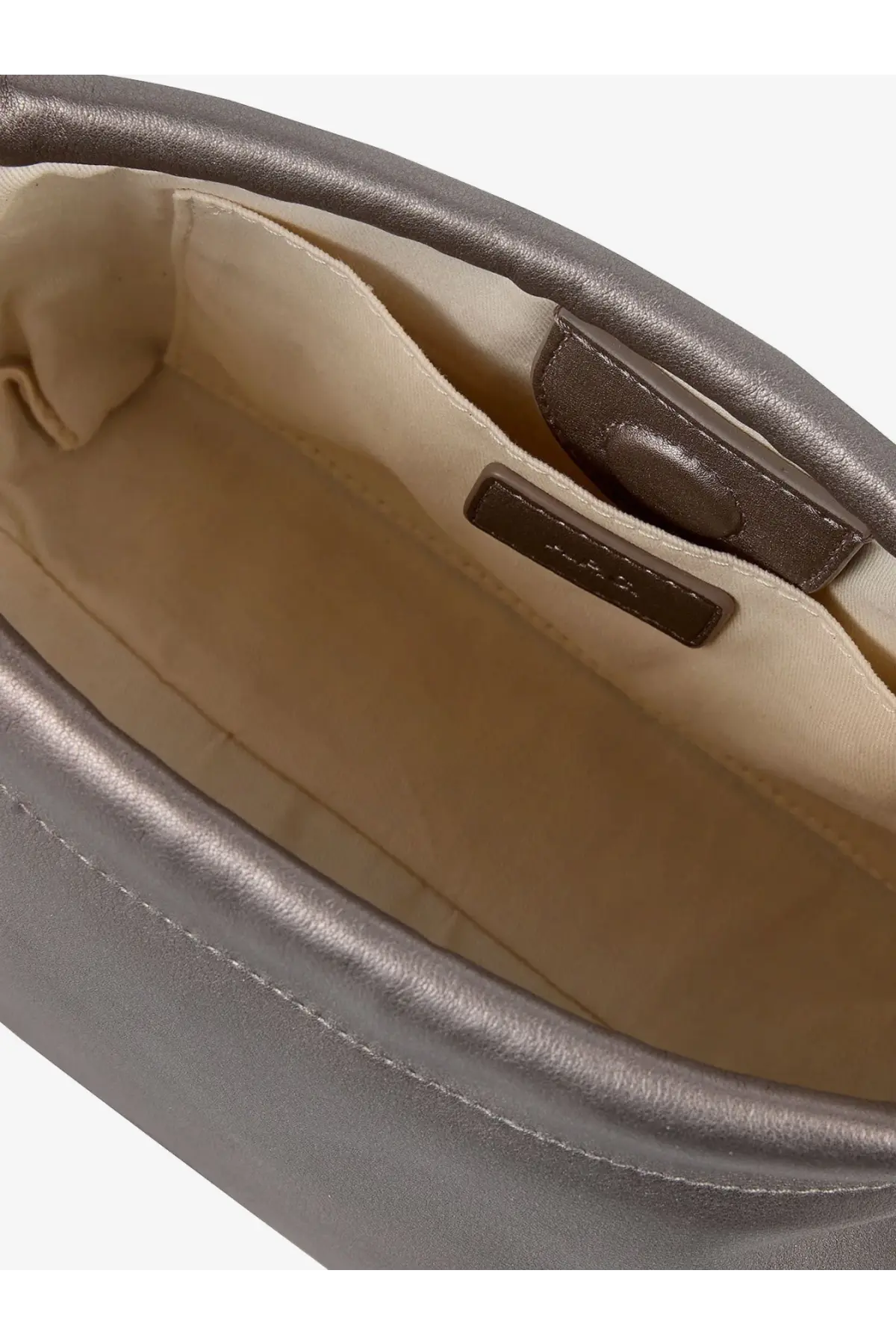 A.P.C women’s Ninon synthetic leather crossbody bag in silver with beige interior lining and small brown leather tag