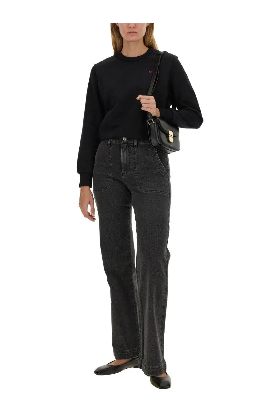 Black leather crossbody bag with gold tone hardware and rectangular flap closure paired with A.P.C women’s sweatshirt black
