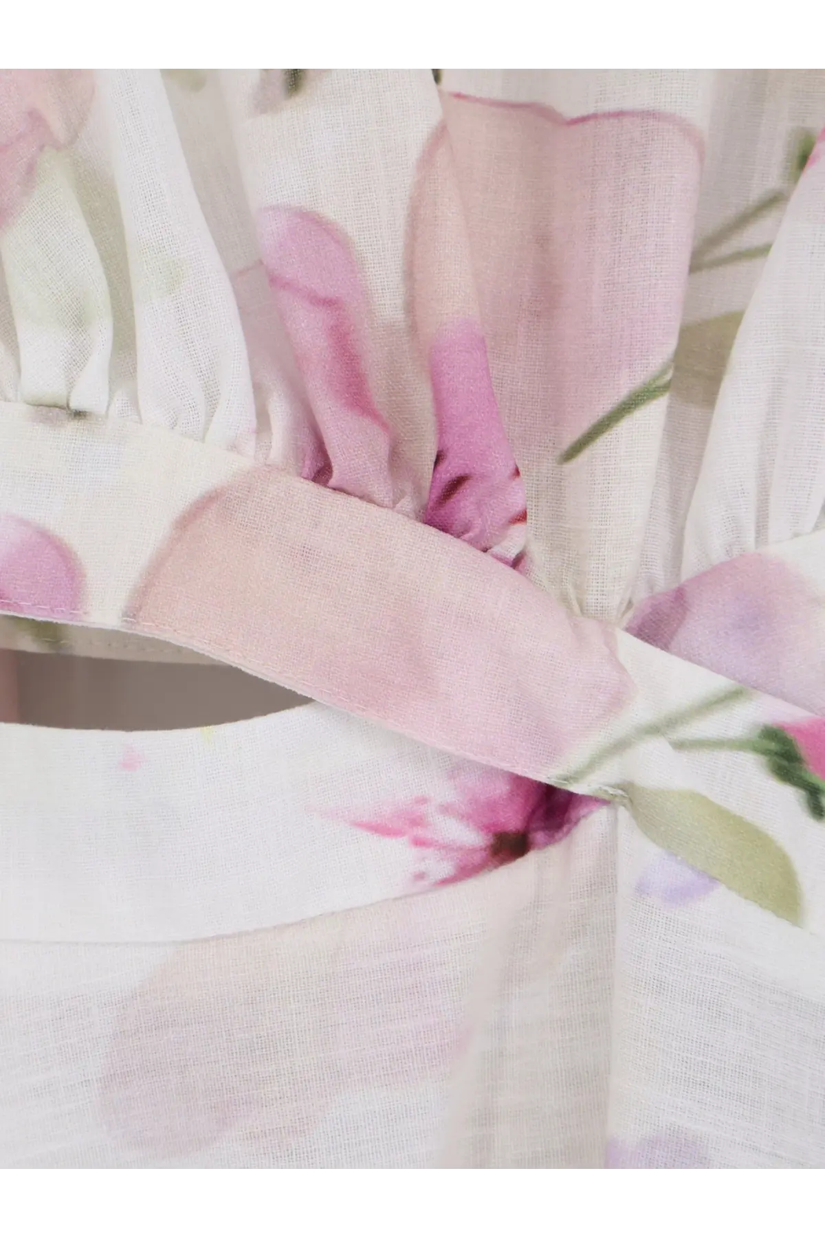 Actualee women’s linen and cotton long dress featuring delicate white fabric with soft pink floral patterns and ruffles