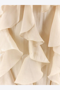 Cream-colored layered ruffle fabric of actualee women’s long white dress with lightweight flowing texture