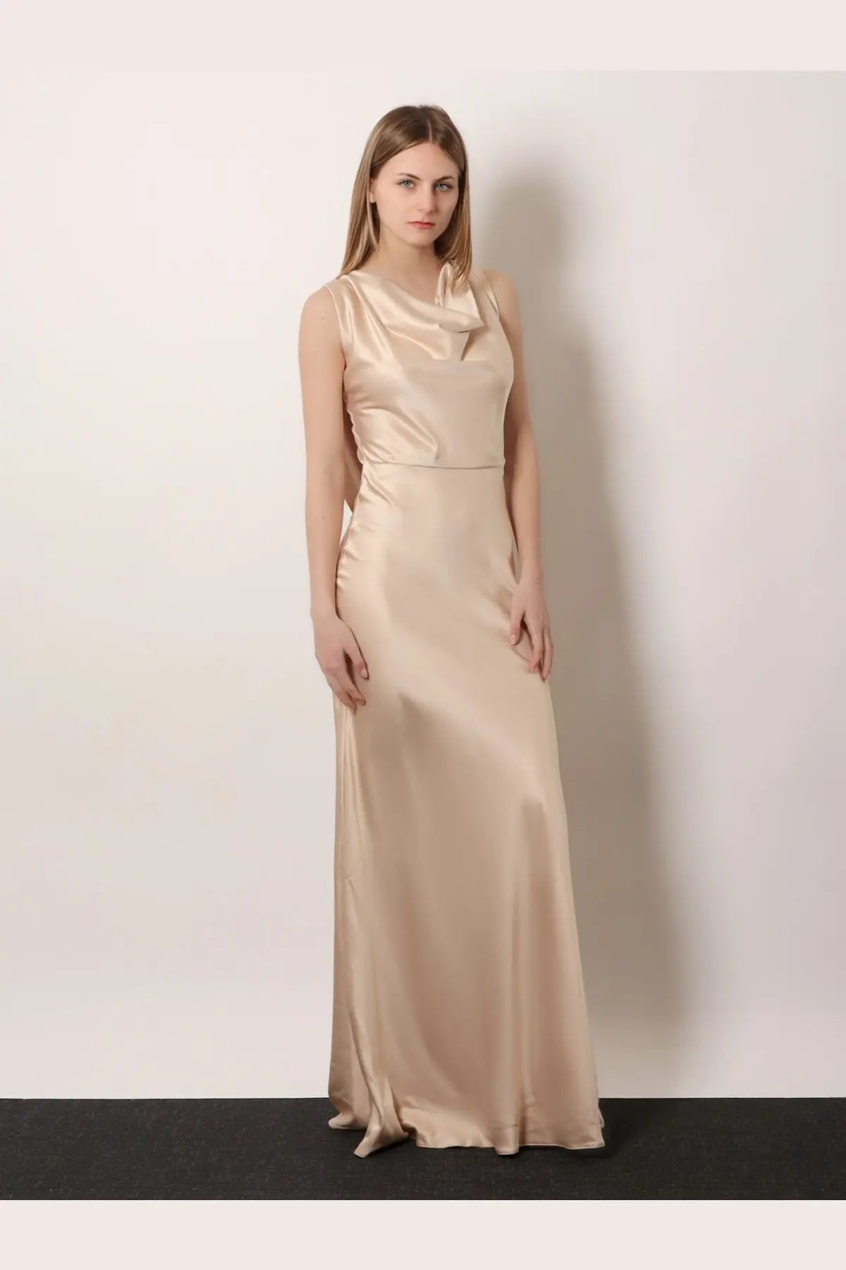 Actualee women’s satin long dress beige features a sleek floor-length design with a draped neckline and fitted waist