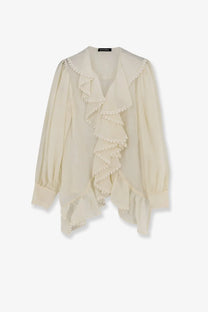 Actualee women’s white blouse with delicate ivory fabric featuring layered ruffles and a soft flowing silhouette