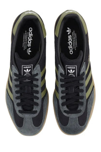 Adidas men’s gazelle indoor sneaker in black with black and olive green suede and three stripes detailing