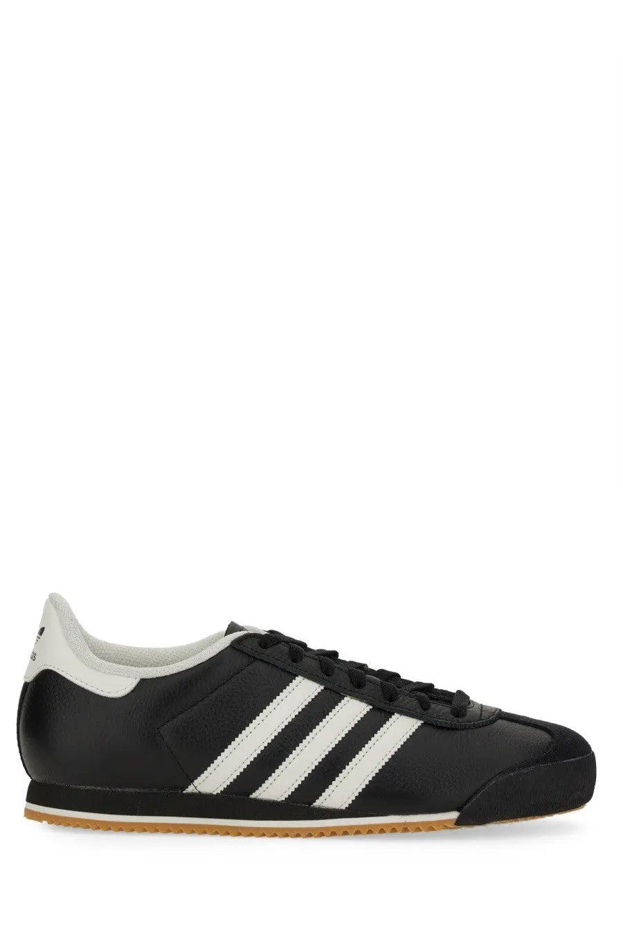 Adidas men’s kick sneaker black black leather samba with white three stripes and gum rubber sole