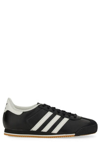 Adidas men’s kick sneaker black black leather samba with white three stripes and gum rubber sole