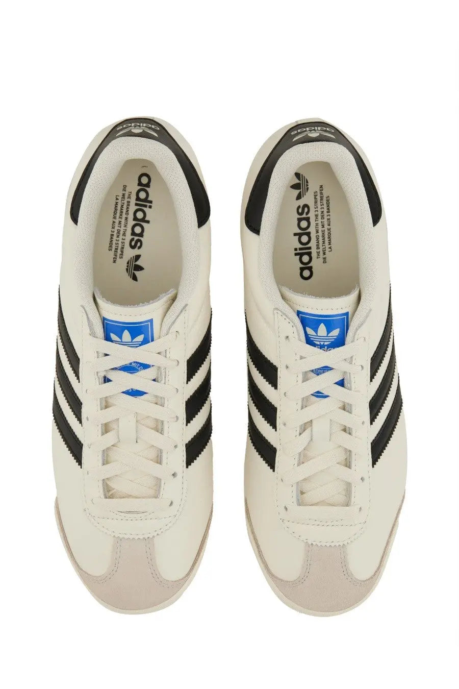 Adidas men’s kick sneaker white featuring white leather with black three stripes and blue branding accents