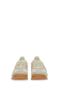 Adidas men’s sneaker white cream-colored suede and canvas with tan rubber soles and three parallel stripes on side
