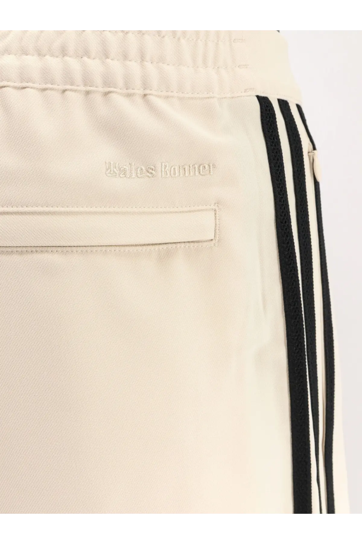 Adidas originals by wales bonner men’s cream athletic nylon trousers with black stripes and cream balenciaga logo embroidery