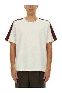 Cream-colored cotton t-shirt with maroon shoulder panels and ribbed trim from adidas originals by wales bonner