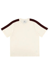 Cream-colored adidas Originals by Wales Bonner men’s t-shirt with dark maroon stripes on shoulders in white fabric