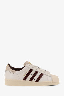 Adidas Originals by Wales Bonner men’s WB Superstar cream leather sneakers with maroon stripes and brown accents