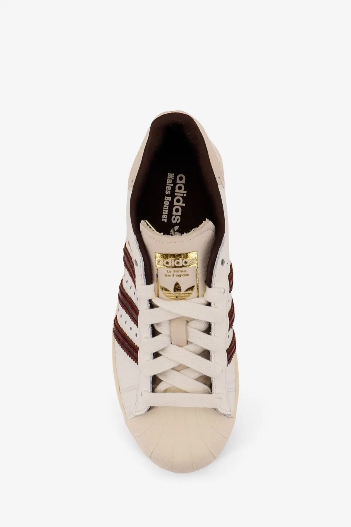 Cream-colored adidas Originals by Wales Bonner leather sneakers with maroon stripes and gold-toned heel tab white