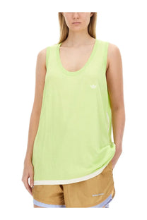 A light green adidas Originals by Wales Bonner unisex sleeveless knitted vest with white trim on hem and neckline