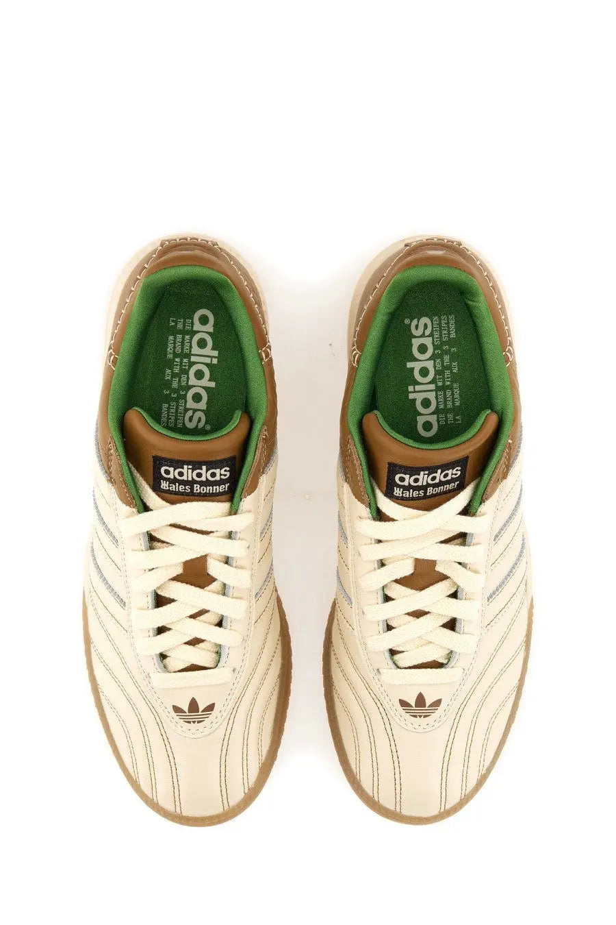 Cream-colored adidas Originals by Wales Bonner Samba sneaker with brown accents green lining and signature three stripes