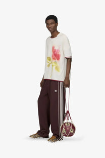 Maroon adidas originals by wales bonner unisex soccer ball in mesh net bag with white drawstrings made from recycled material
