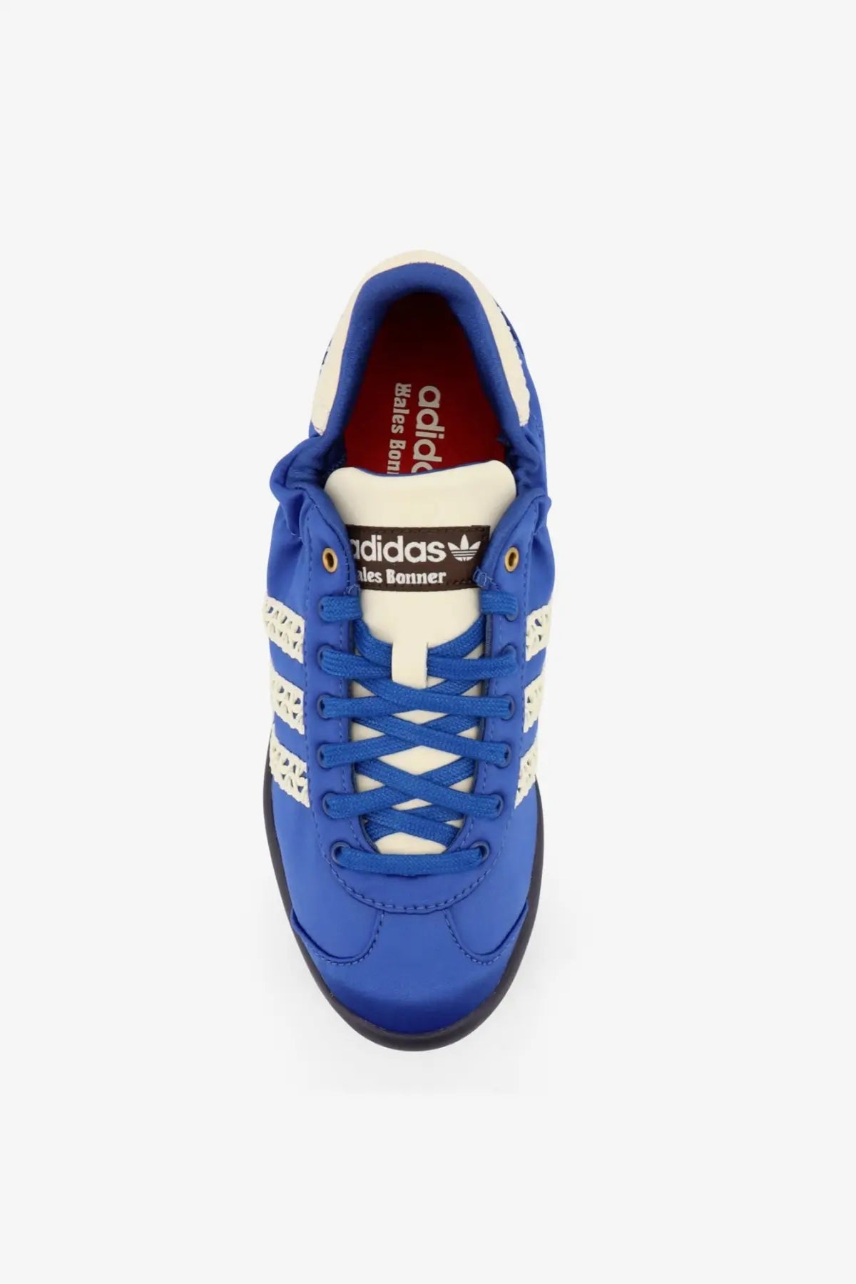 Vibrant royal blue adidas x les bonner satin sneakers with white three stripes and black rubber sole for women
