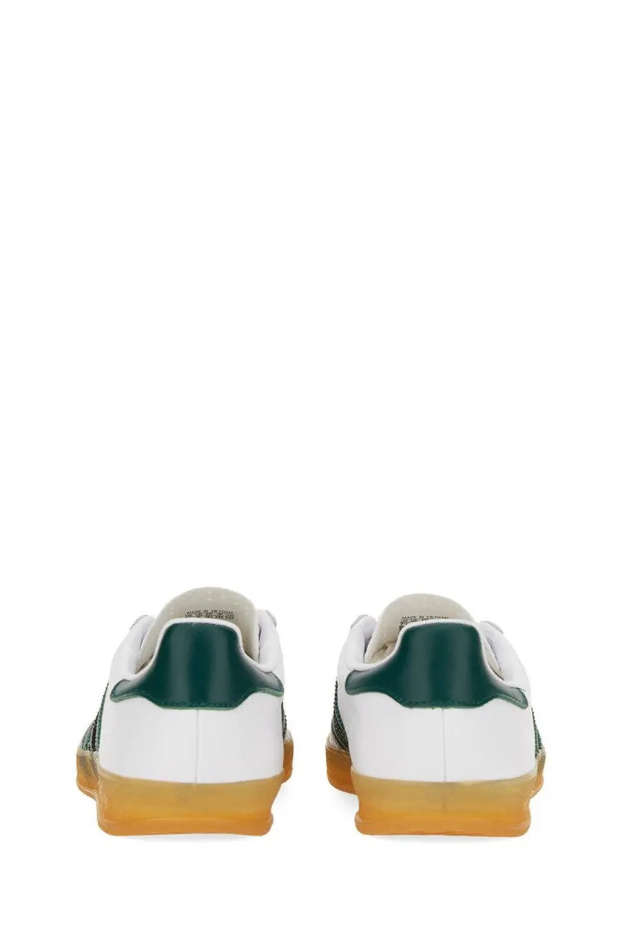 Adidas unisex gazelle indoor shoe in white with dark green accents and gum-colored rubber sole