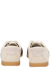 Adidas unisex gazelle lo pro sneaker beige with white suede, black mesh side panels, and tan rubber sole
