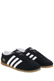 Adidas unisex Gazelle LO Pro sneaker in black suede with white three stripes and gum rubber sole