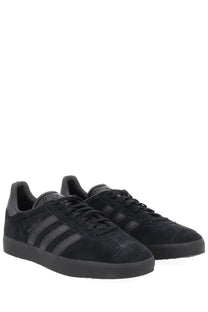 Adidas unisex gazelle sneaker in black suede with dark gray three stripes and matching laces