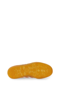 Orange rubber sole with textured honeycomb pattern on adidas unisex indoor gazelle sneaker blue