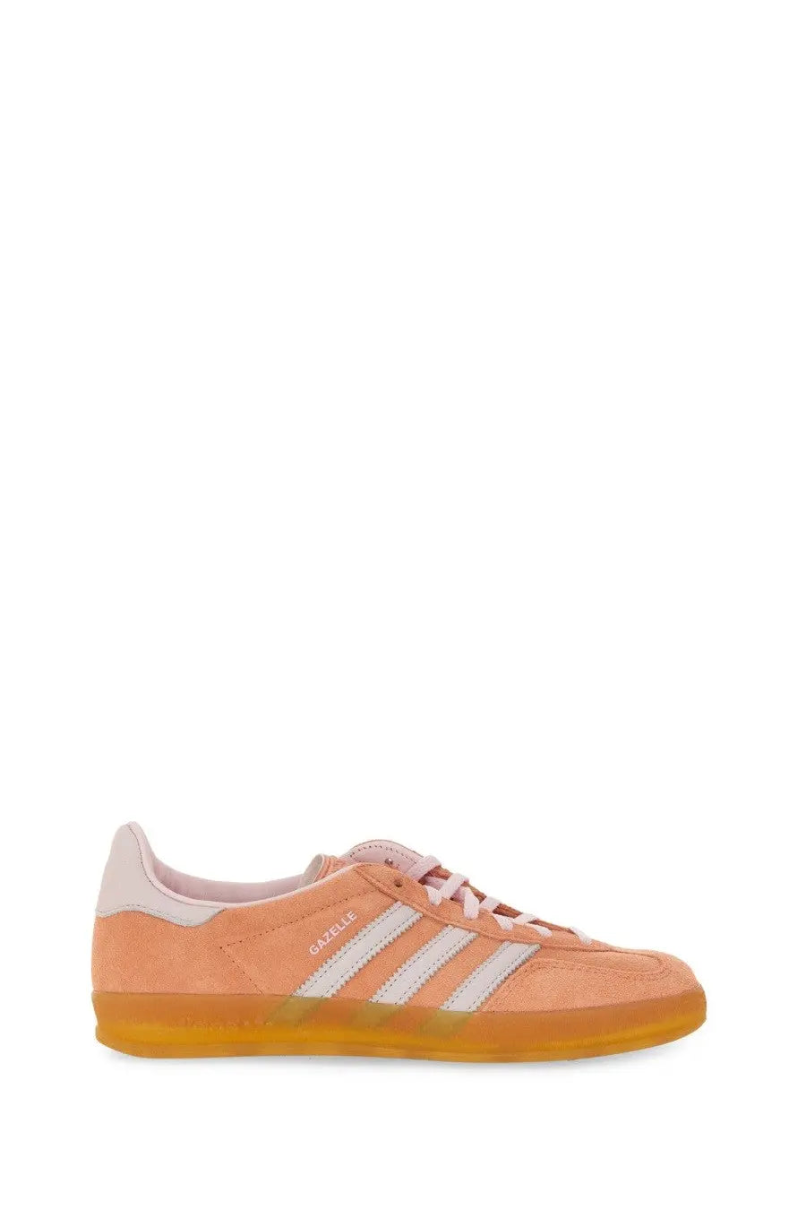 Peach-colored suede adidas gazelle unisex indoor sneaker with white stripes and translucent orange rubber sole